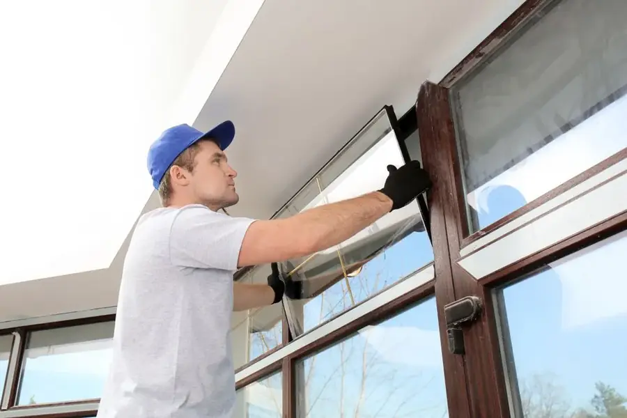 ASAP Glass technician installing a residential window pane